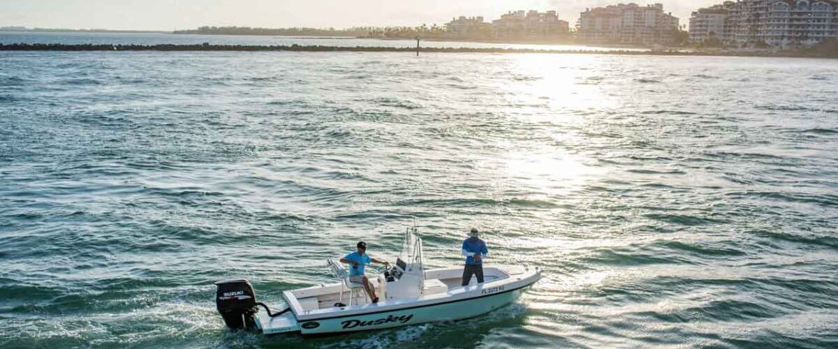 A fisherman on a small boat in Miami