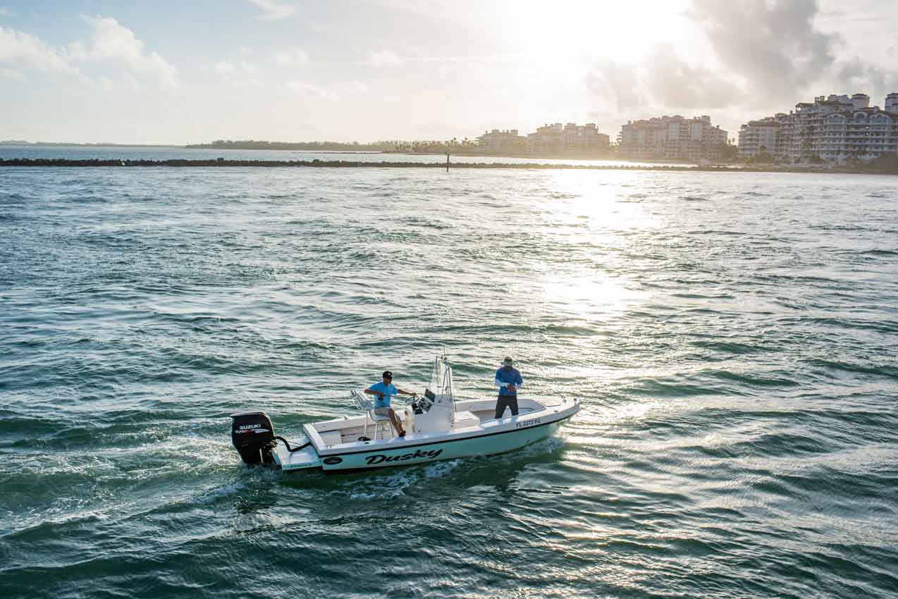 A fisherman on a small boat in Miami