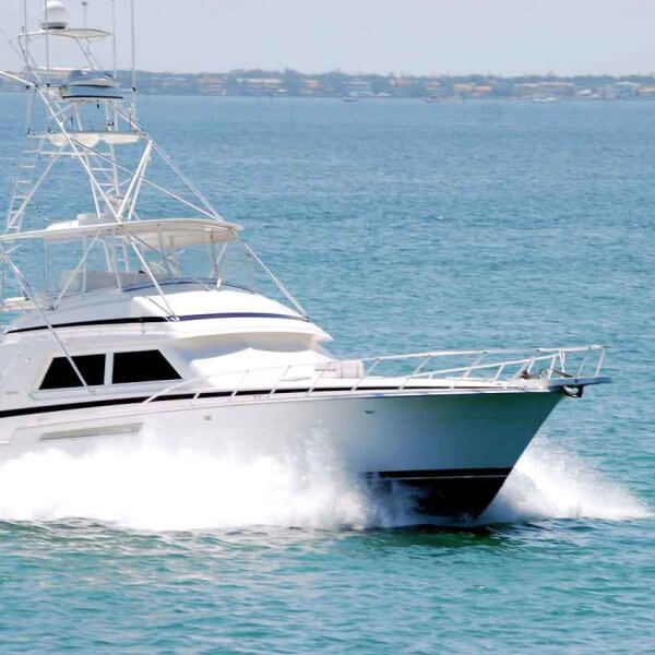 white sport fishing boat sailing on biscayne bay’s waters